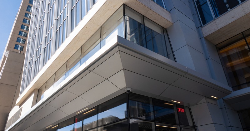 Exterior, angle view to coffee bar, low angle from side walk