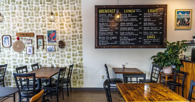 Interior, tables with chairs ready for guests