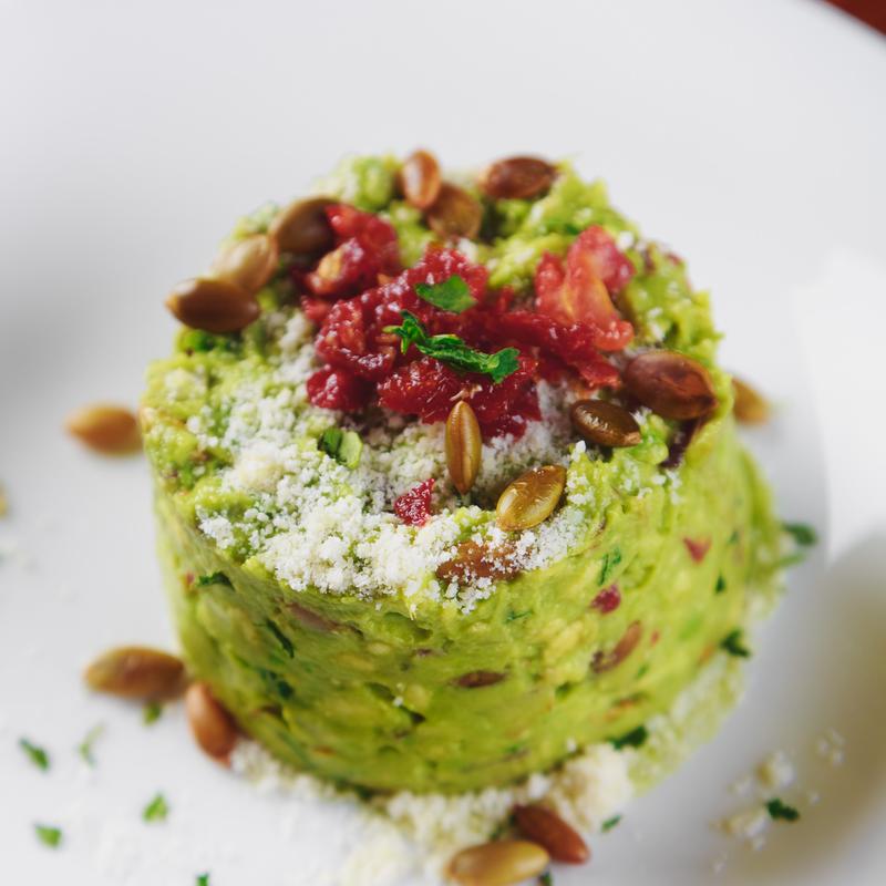 Sun Dried Tomato & Roasted Pumpkin Seed Guacamole photo