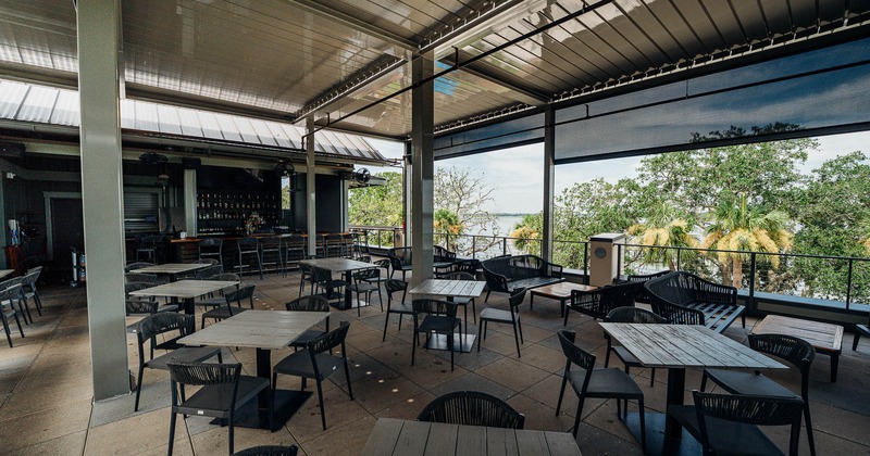 Exterior, rooftop area with tables and chairs ready for guests
