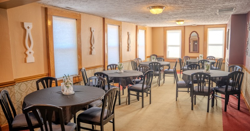 Interior, dining area with round tables