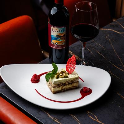 Pistachio tiramisu and red wine.