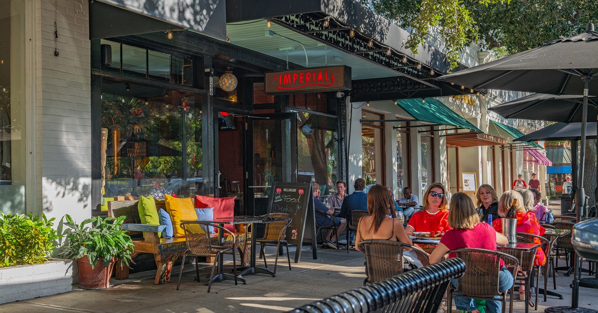 Outdoor seating area in front of the restaurant entrance