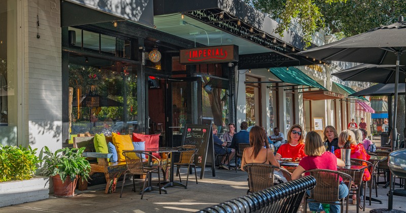 Outdoor seating area in front of the restaurant entrance