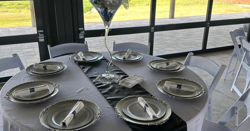 The restaurant's interior, a set table