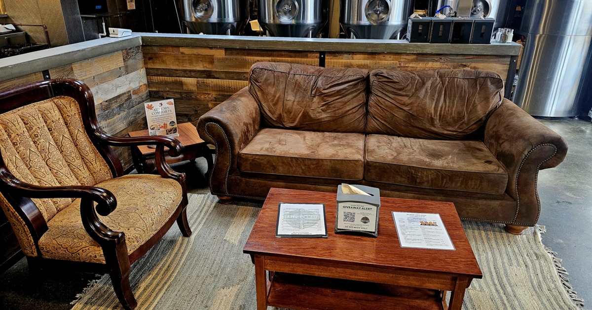 Lounge are with couches, comfy chairs, coffee table and side tables