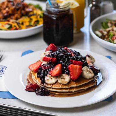 Pancakes with fruit topping.