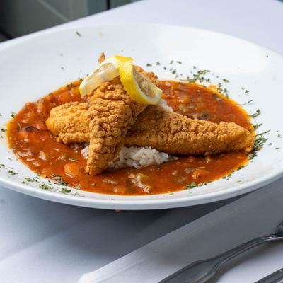 Roz's Shrimp Creole served with Fried Catfish Strips.