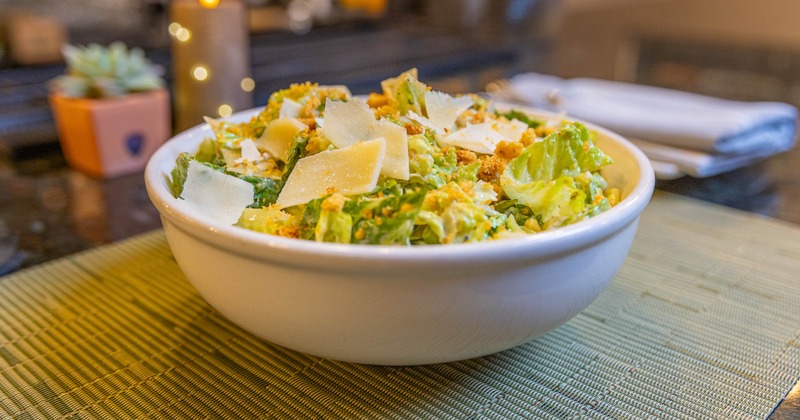 A bowl of Caesar salad