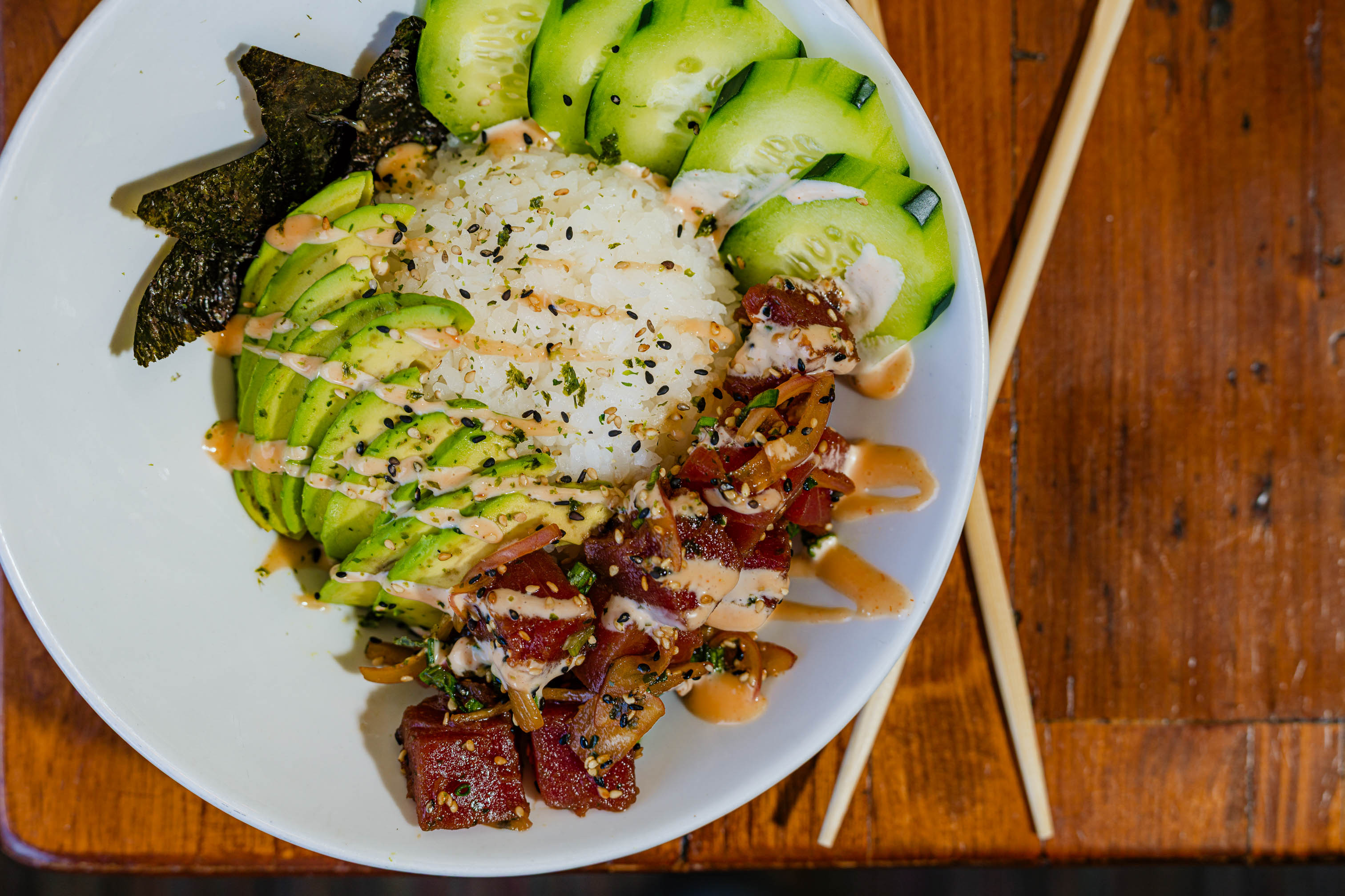 Ahi tuna bowl, served, top view, closeup