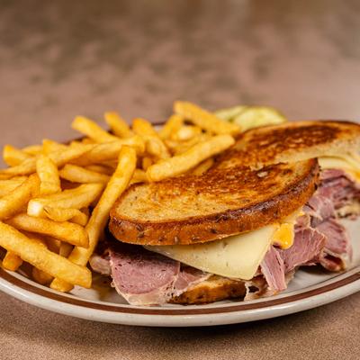 Reuben sandwich with fries.