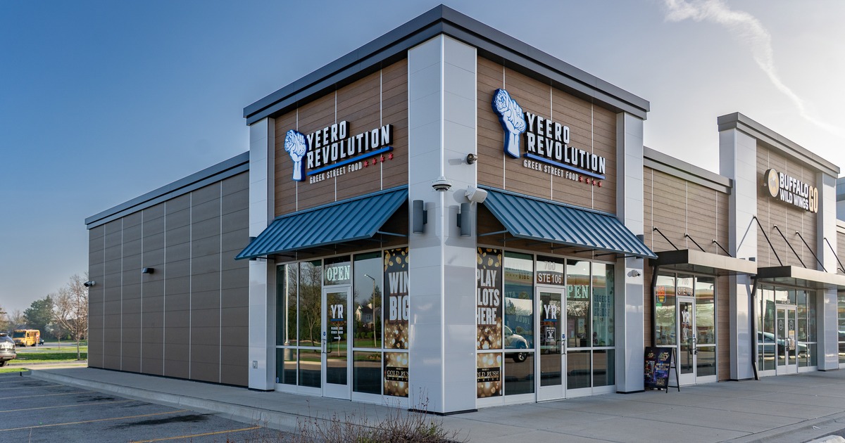 Exterior, angle view to restaurant, entrance, sign