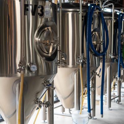 Stainless steel fermentation tanks.
