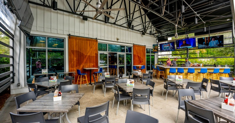 Exterior, seating place with tables and chairs on covered patio