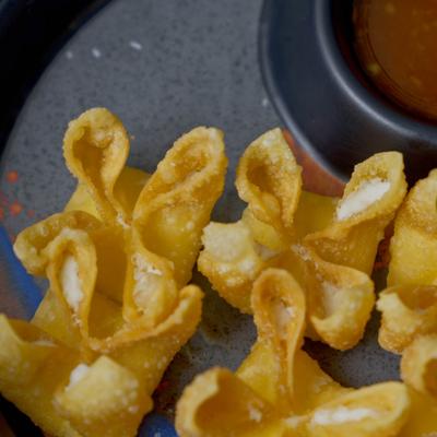Crab Rangoon with dip.