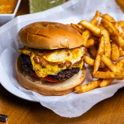 Beef kebab burger with fries.