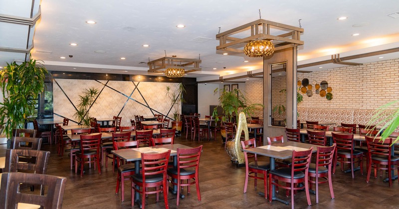 Interior, tables and chairs ready for guests