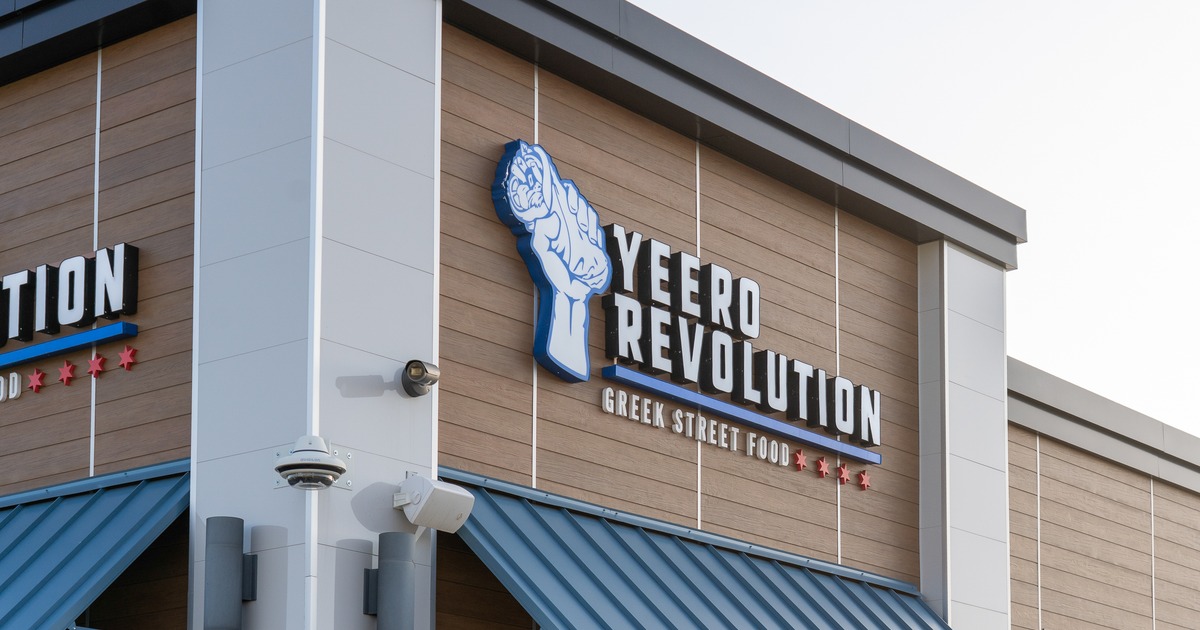 Exterior, sign above entrance, close up