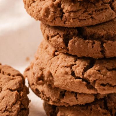 Close-up of stacked chocolate chip cookies.