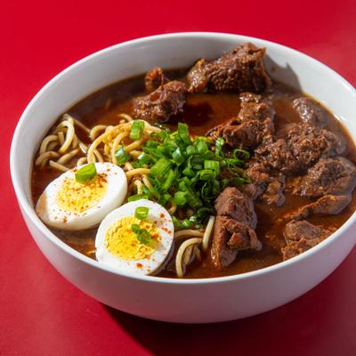 Yakamein, New Orleans-Style Noodle Soup with beef, boiled egg, and herbs.