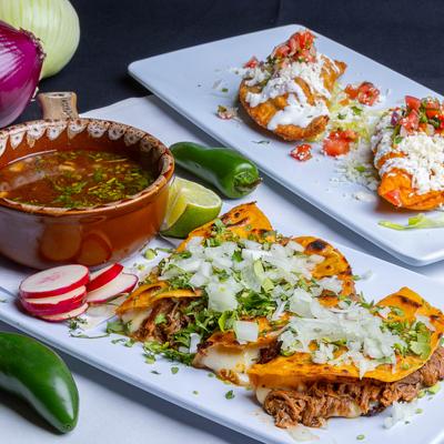 Birria tacos and empanadas.
