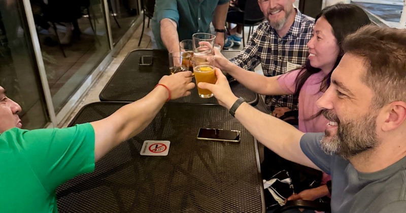Guests toasting with drinks