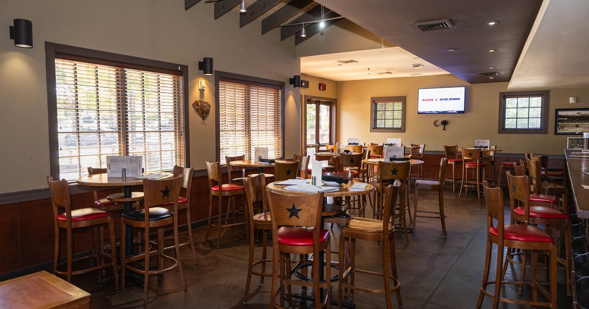 Seating area, tall tables and stools