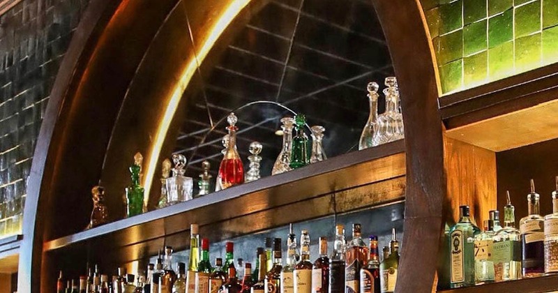 Back bar shelves with spirits, close up