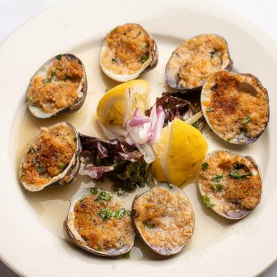 Baked Clams, topped with breadcrumbs.