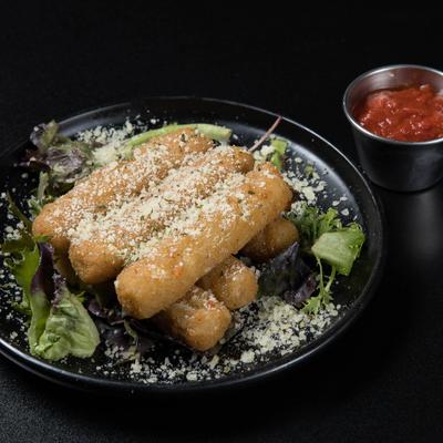 Mozzarella sticks with marinara sauce.
