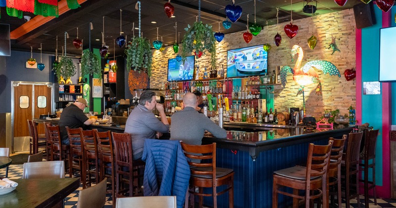 Interior, bar area with guests