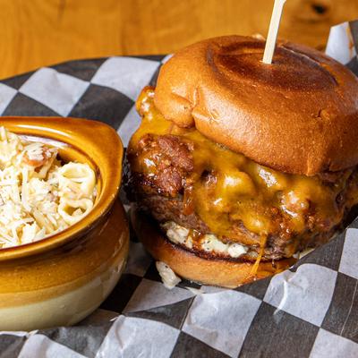 Carolina Burger served with cheese pasta.