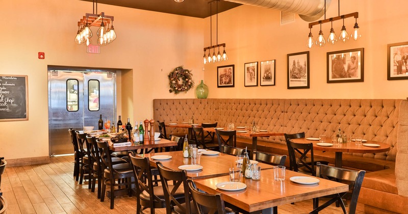 Interior, seating area, tables ready for guests