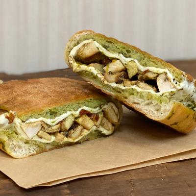 Chicken Melt sandwich with mozzarela and basil pesto.