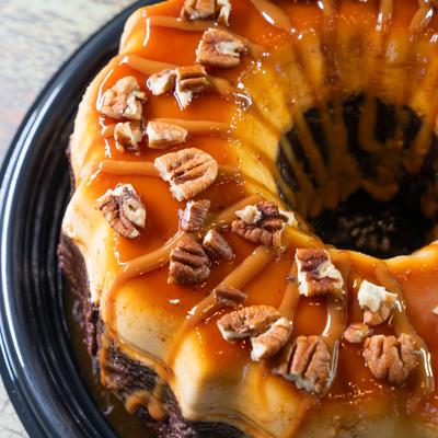 Flan topped with caramel and pecans.