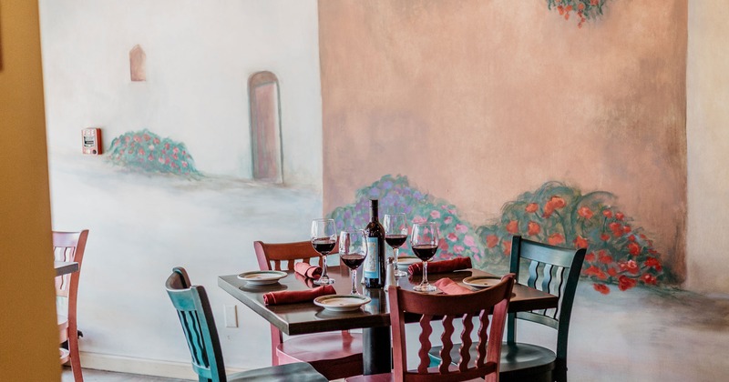 Interior, a set table with tableware and wine