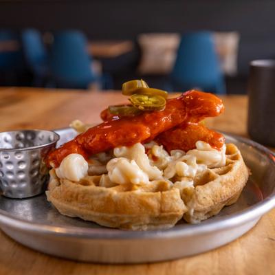 Too Hot Ta Trot Waffle served with spicy syrup.