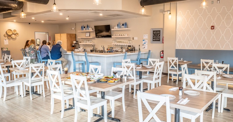 Interior, bar area and dining set tables ready for guests