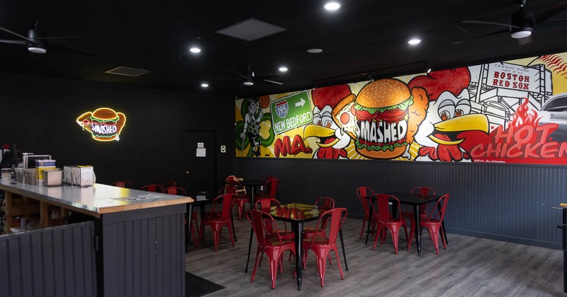 Seating area with a large wall mural