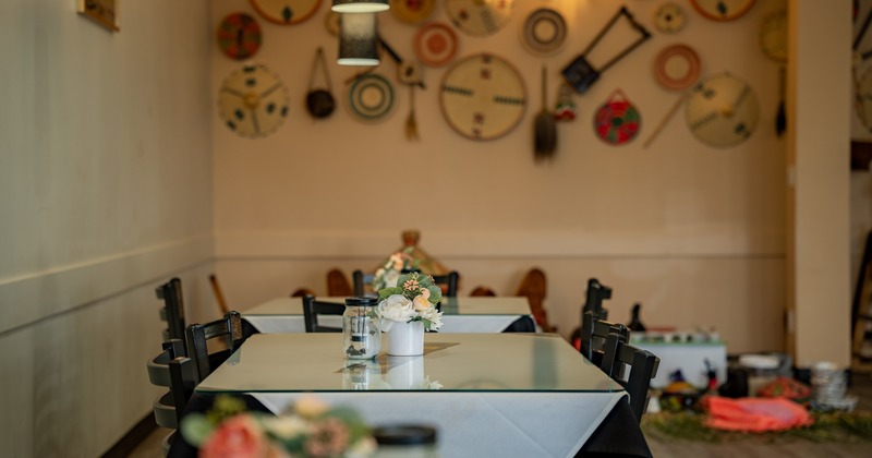 Diner table, close up, decorated wall behind