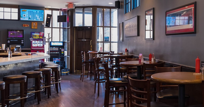 Interior, a round table with chairs, bar on the left side