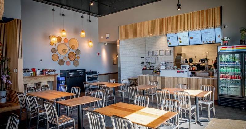 Interior, dining area, tables ready for guests