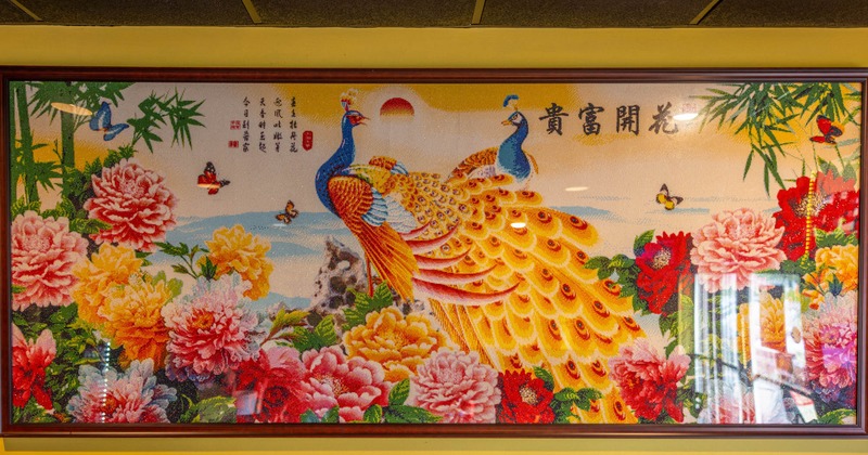 Decorated painted wall, a peacock in aflower garden picture
