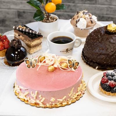 Assorted desserts and cakes displayed on a table.