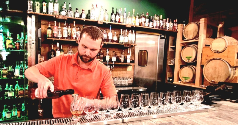 Bartender pouring drinks