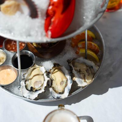 Seafood tower, tier with oysters.