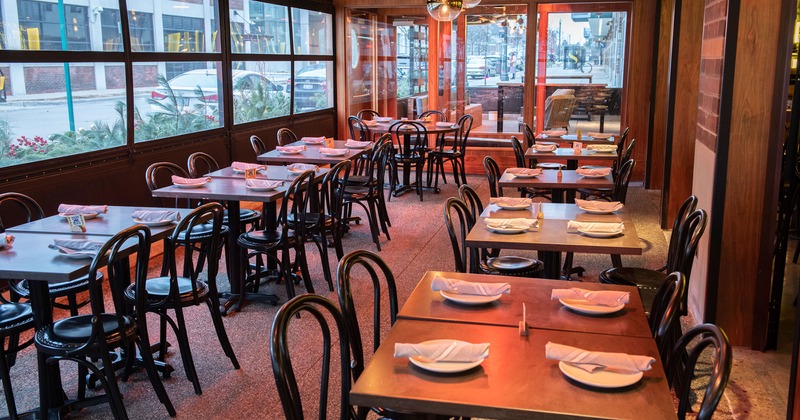 Interior, dining area with tables with tableware