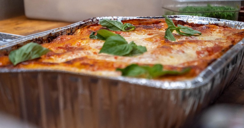 Lasagna, topped with basil