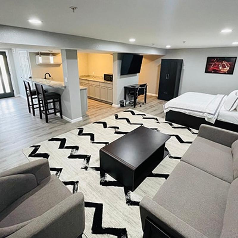 The interior of an apartment room, furniture, lights.