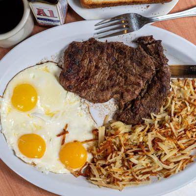 Steak and Eggs, with hash browns.